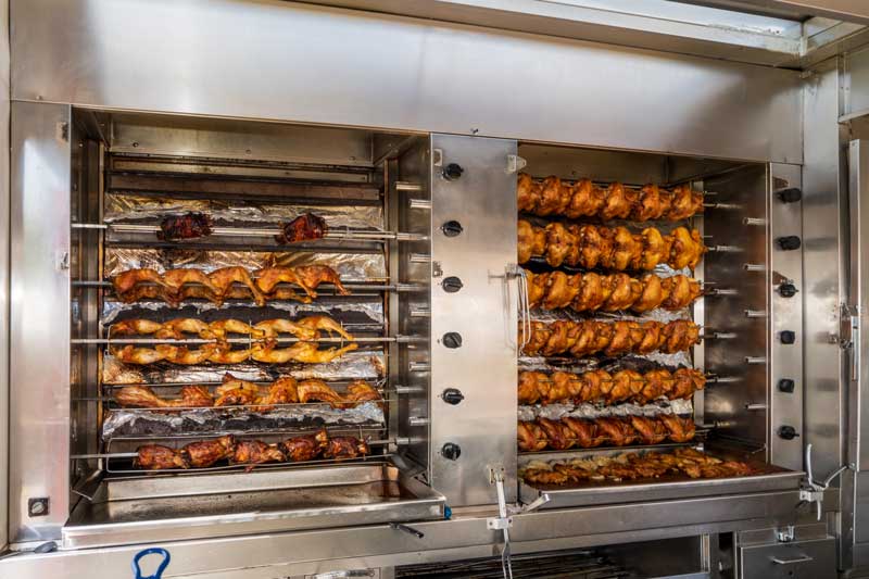 Fresh rotisserie chicken cooking at a Pak n Save Supermarket near you.