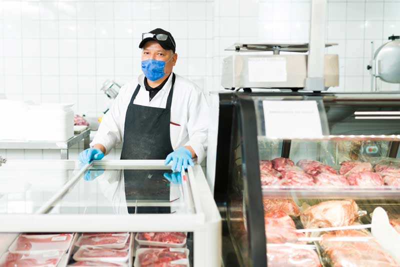 Butcher with meat