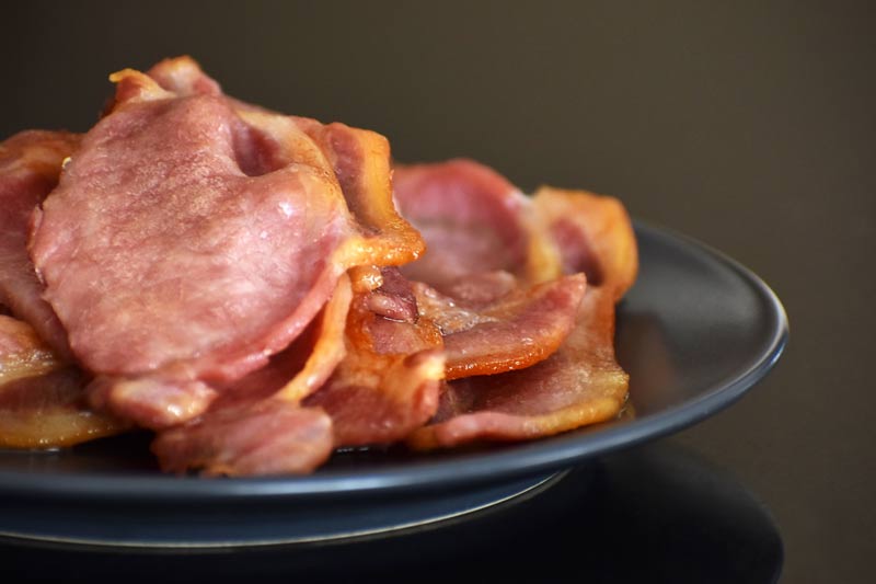 Cooked bacon on a plate